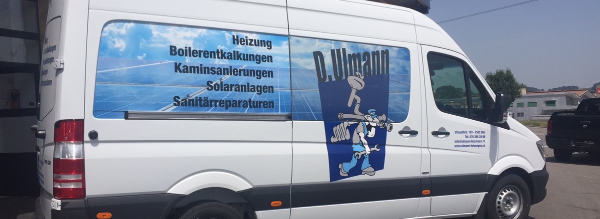 Servicefahrzeug von Ulmann Heizungen: weisser Sprinter mit Aufschrift Heizung, Boilerentkalkungen, Kaminsanierungen, Solaranlagen und Sanitärreparaturen.